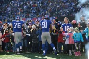 The Giants greeting children from Sandy Hook